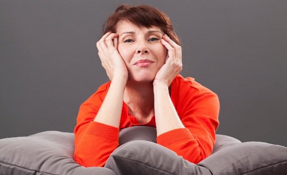 Menopause-Age Woman Sitting