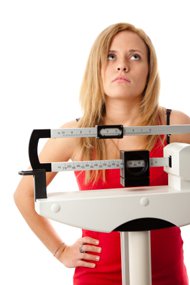 Woman Standing on The Scale, Frustrated