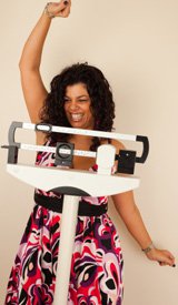 Woman Celebrating Successful Weight Loss